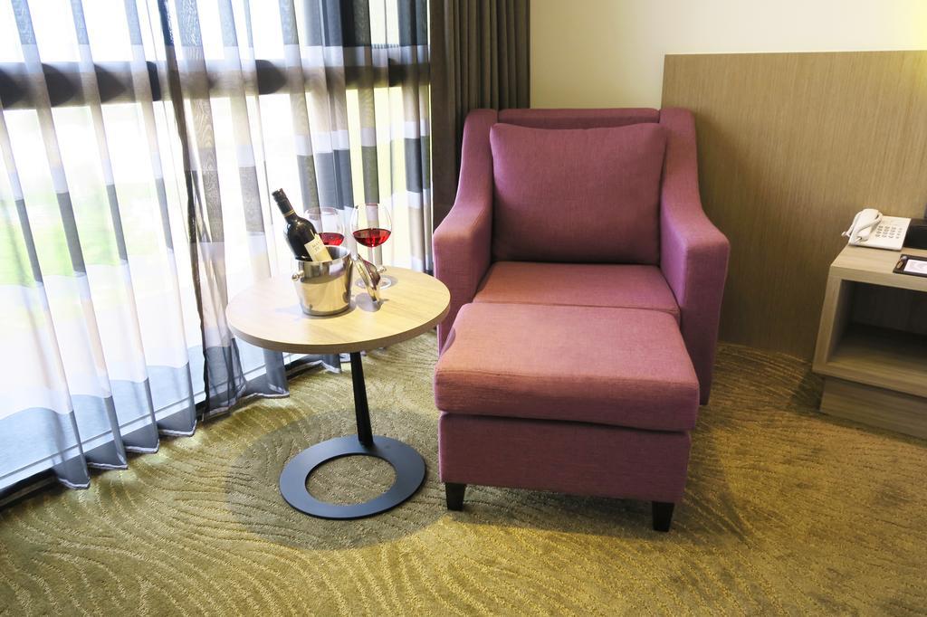Look Royal Resort Jiayi Zewnętrze zdjęcie A chair with a footrest